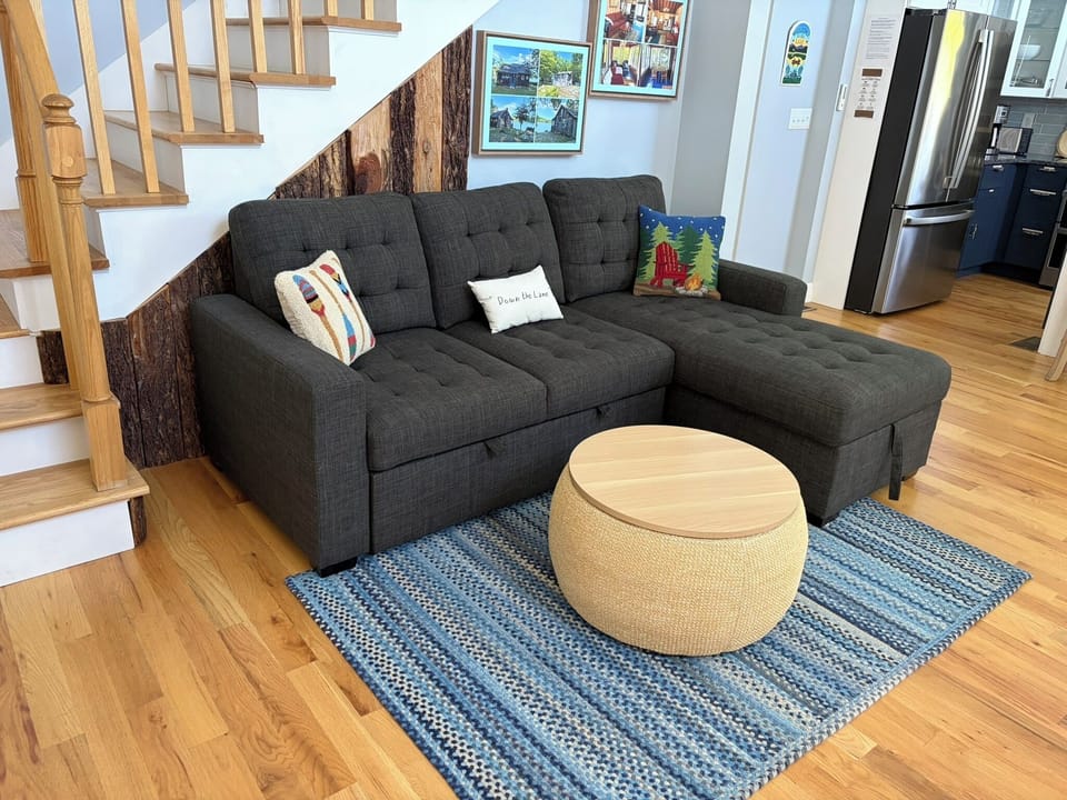 Sectional seating with cozy fleeces in ottoman.