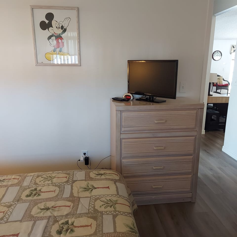 Every bedroom has TV, fan, clock, laundry basket, night light