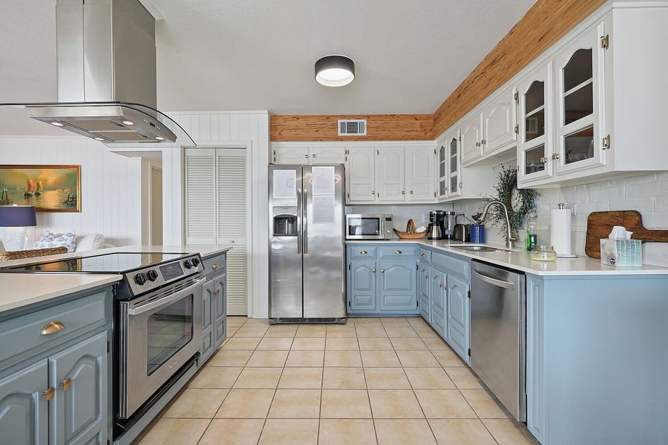Kitchen with all stainless steel appliances.