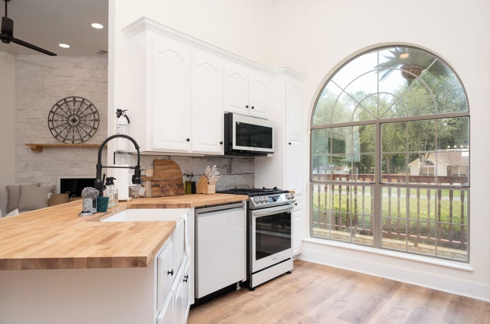 Beautiful brand-new bespoke white glass appliances.