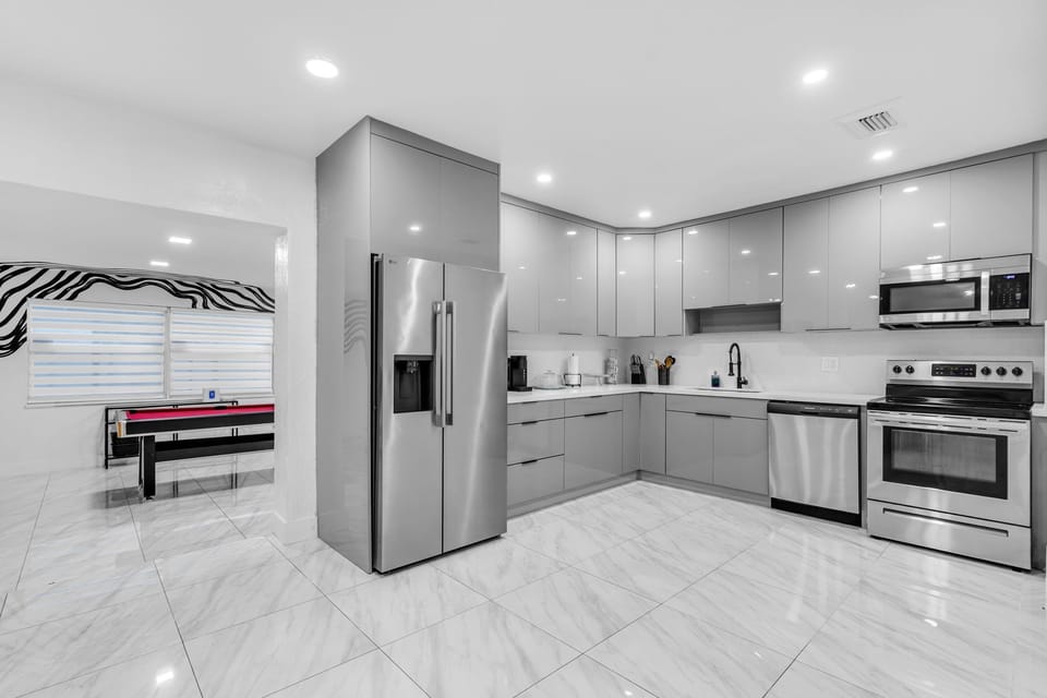 Fully remolded kitchen with stainless steel appliances