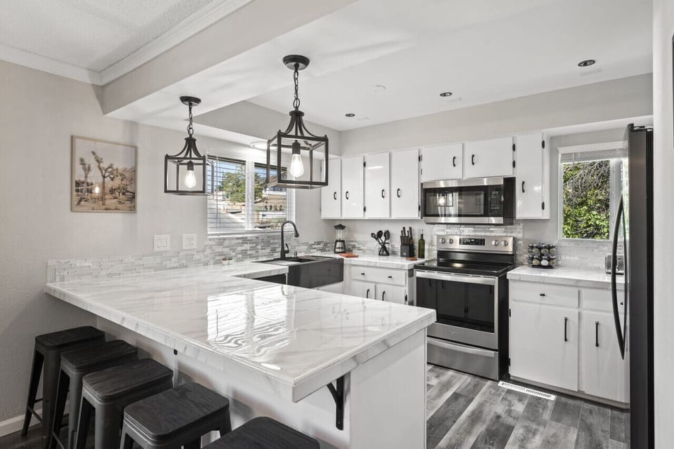 Discover modern elegance w/ our remodeled kitchen.