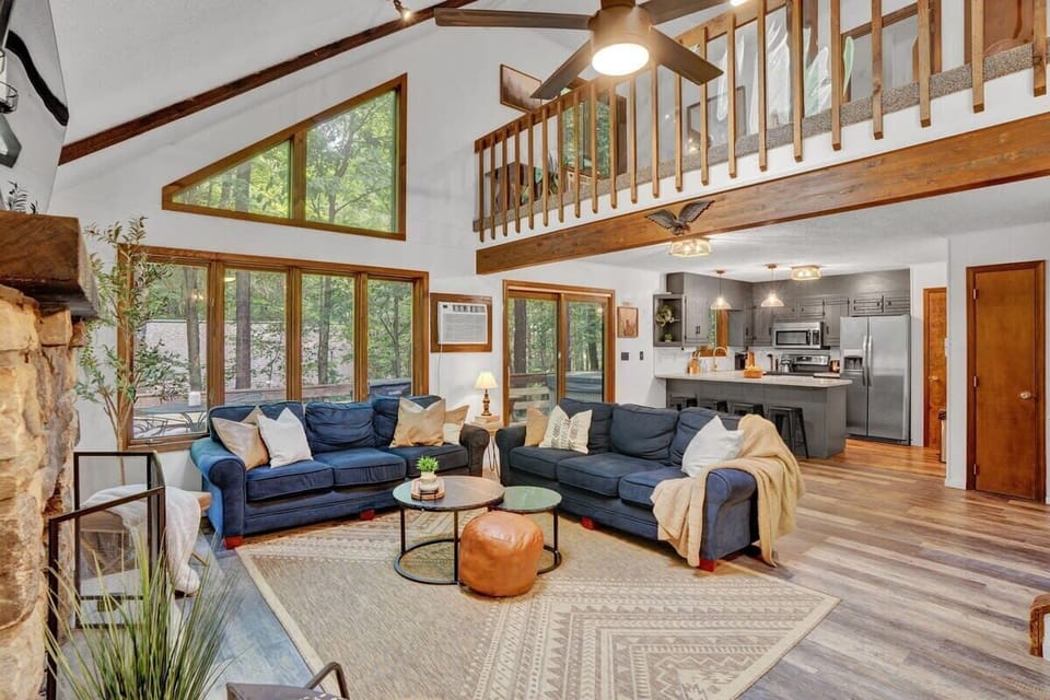 Open Concept Living Room with Vaulted Ceilings & Fireplace