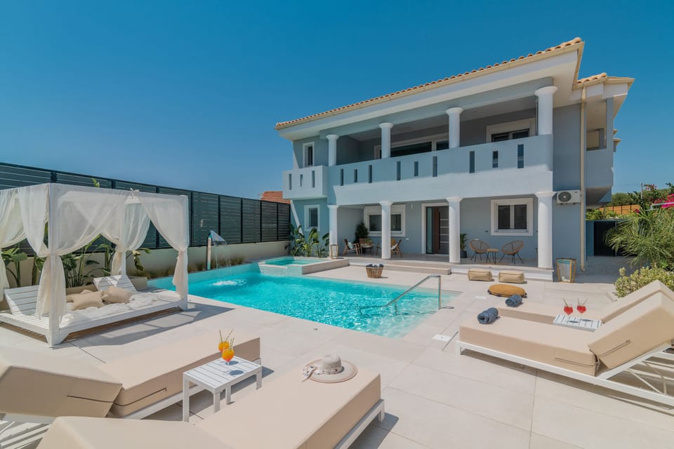 The villa features a private pool and spa whirlpool.