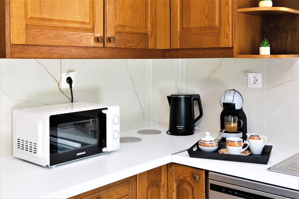 Morning Station: Espresso machine, kettle & microwave for breakfast.