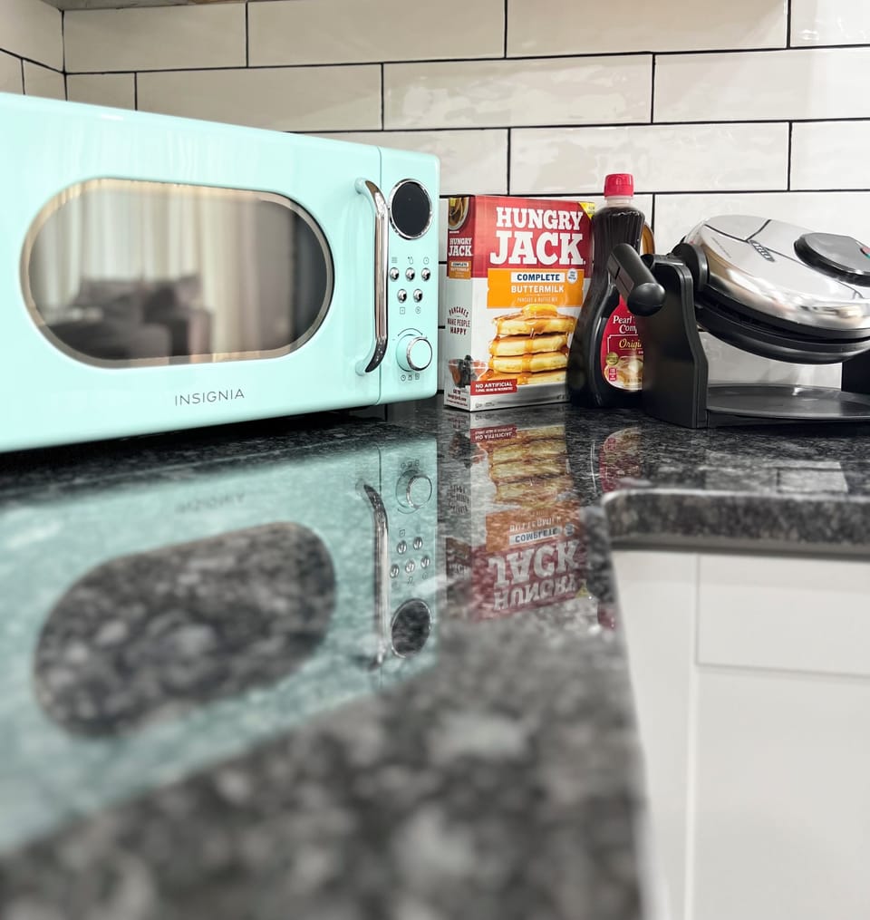Retro microwave & new waffle maker. Complimentary pancake waffle mix & syrup :)