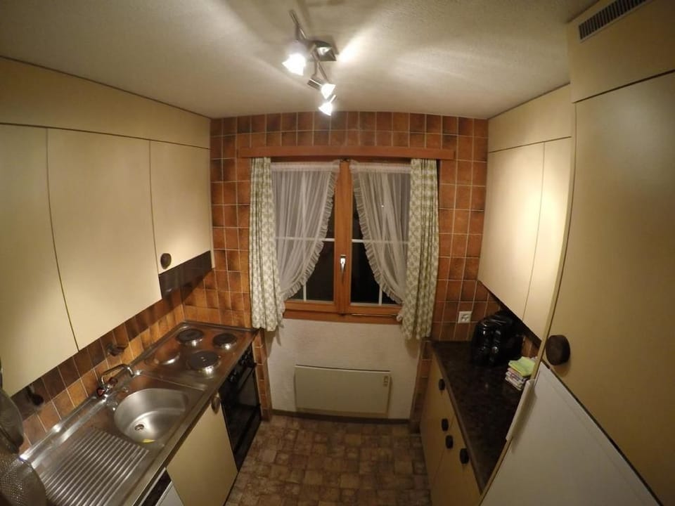 separate kitchen with dishwasher