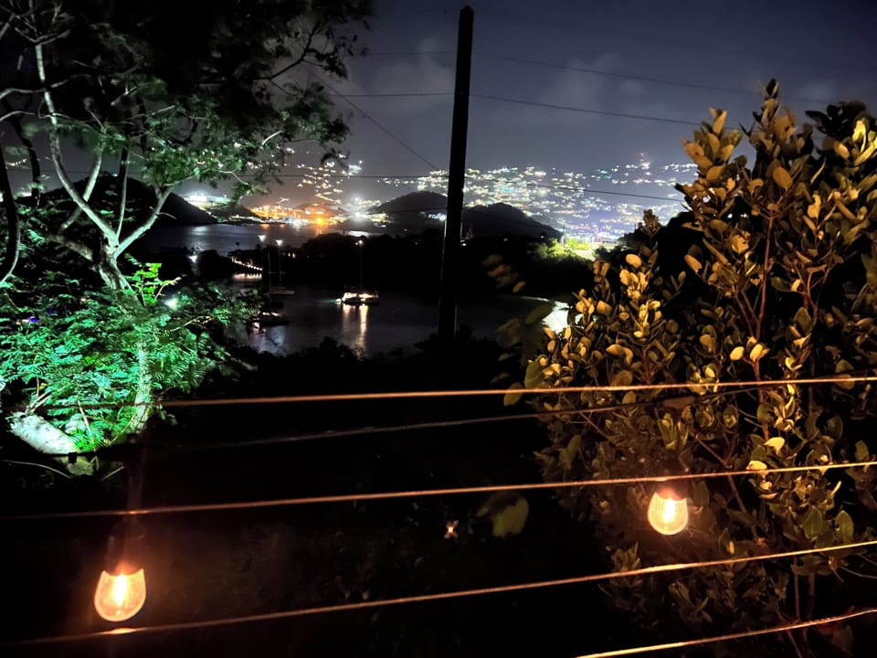Night time view with Saint Thomas in the background.
