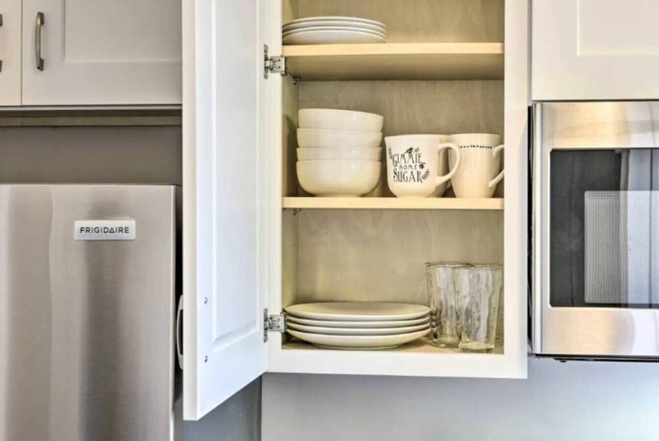 Plates, bowls, mugs, wine glasses, drinking glasses, utensils, pots, pans, cooking utensils etc. are provided