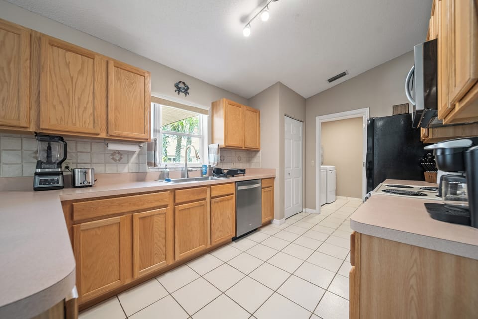 Coffee maker, kettle, blender, toaster and more provided.