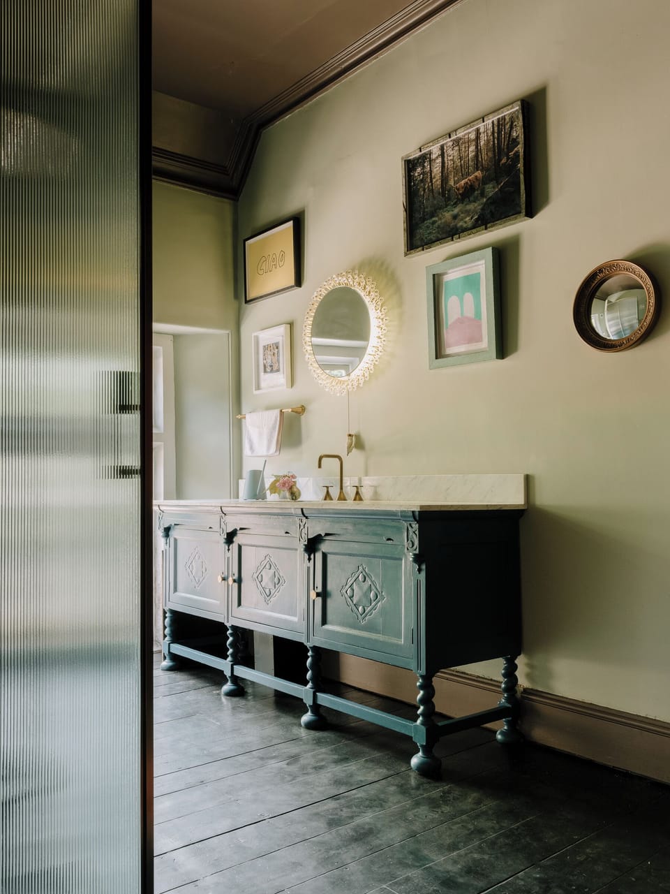 Boutique hotel inspired shower room with fluted glass and Carrara marble. 