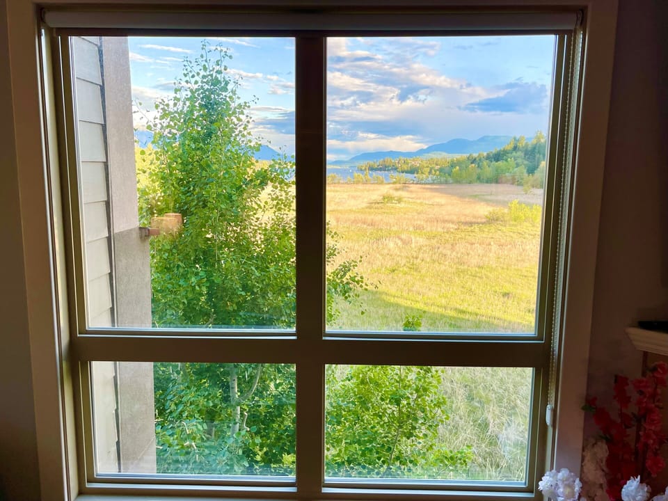 Living room window overlooking lake