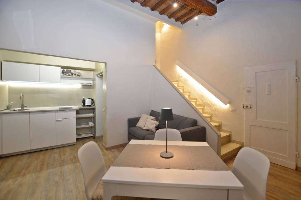 The cosy living-dining room with kitchen corner