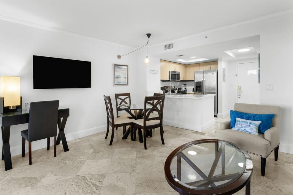Gather comfortably in the airy living space for easy nights.