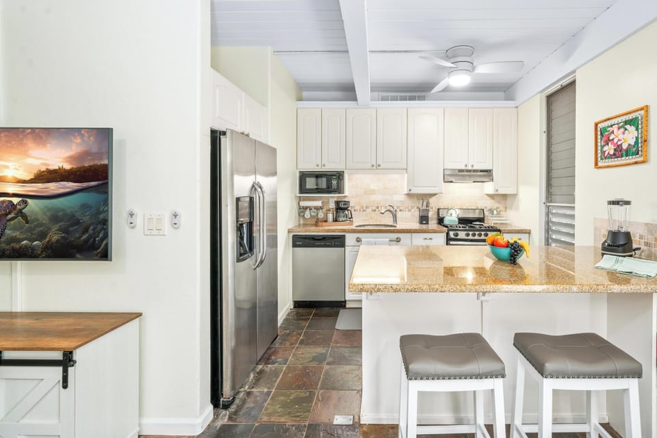 Refrigerator/Freezer with ice and cold water dispenser. Make sure to try some of our Hawaii-made ice cream or Gelato.