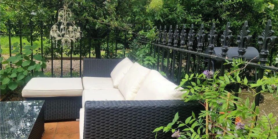 The apartment also has its own private patio, which opens directly to the garden