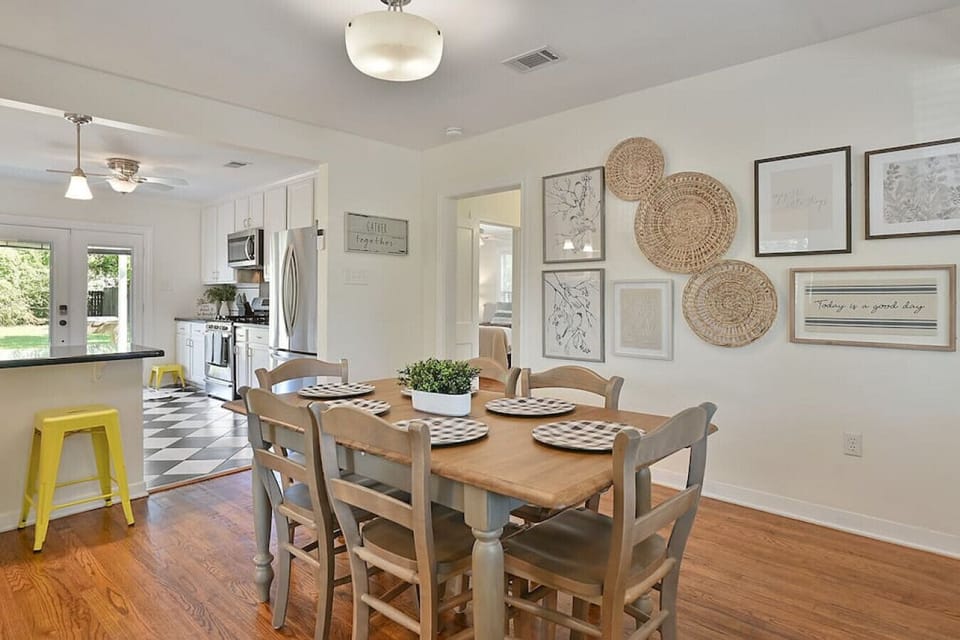 Our dining room has seating for 6 at the wood table.