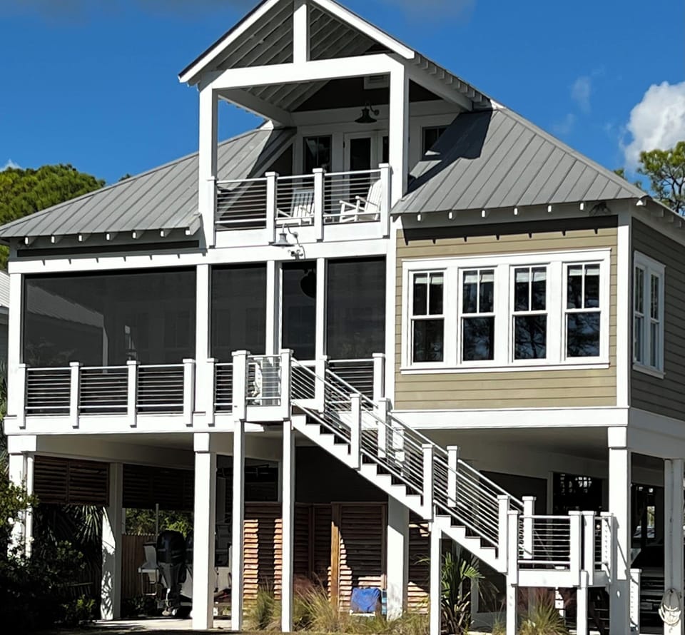 Beachside view of house. Picture taken from path to the beach.
