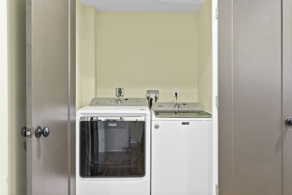 First floor laundry machines off the kitchen