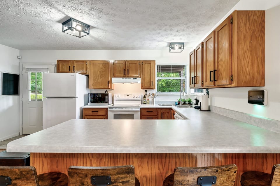 loads of counter / bar space with seating for 4.