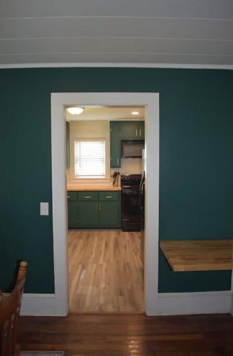 Dining room is a few steps away from the spacious kitchen