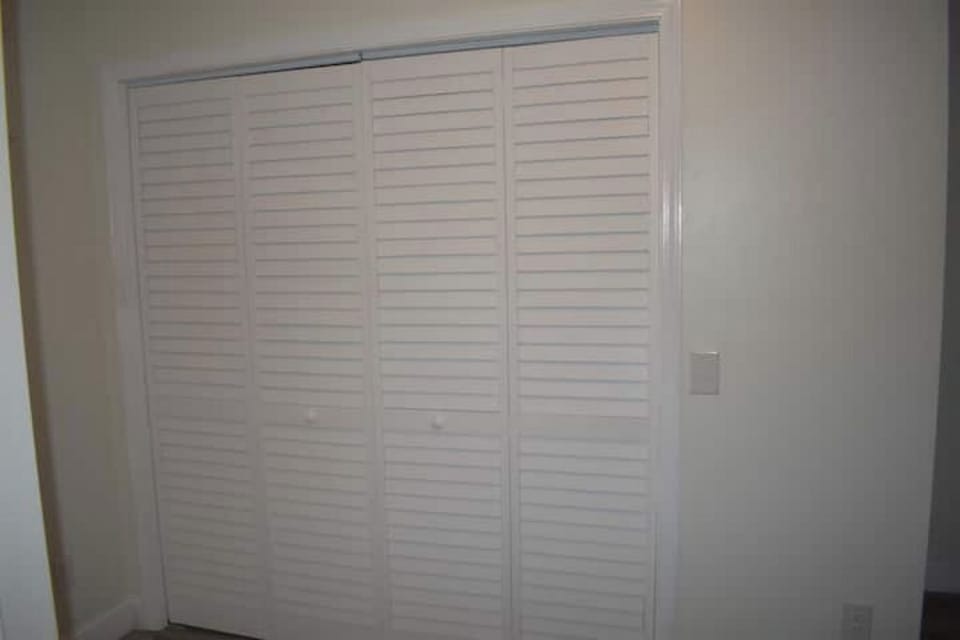 A discreet laundry room is hidden behind the bi-fold doors in the Jay Jack Room