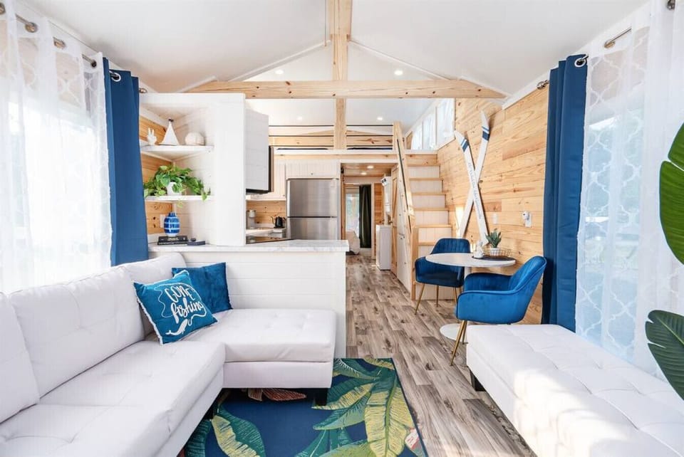 Step inside our lake cabin and be amazed by the high ceilings and delightfully designed decor!