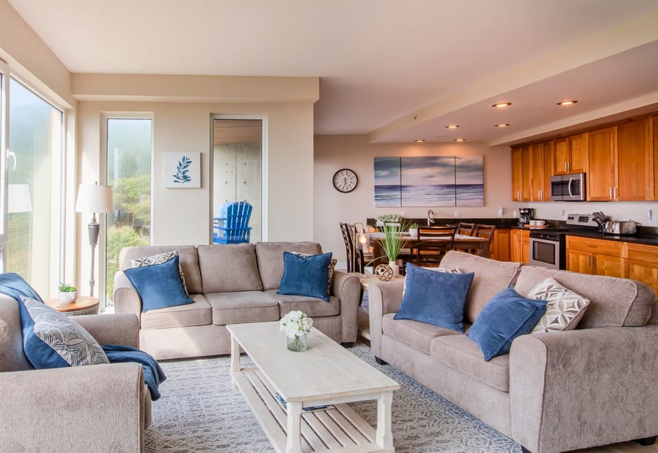 [Living Room] The Hints of Blue throughout the Condo bring out the Ocean Vibes.