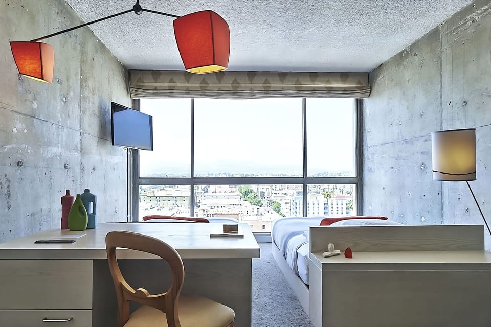 Work peacefully at the desk with sunshine and skyline views