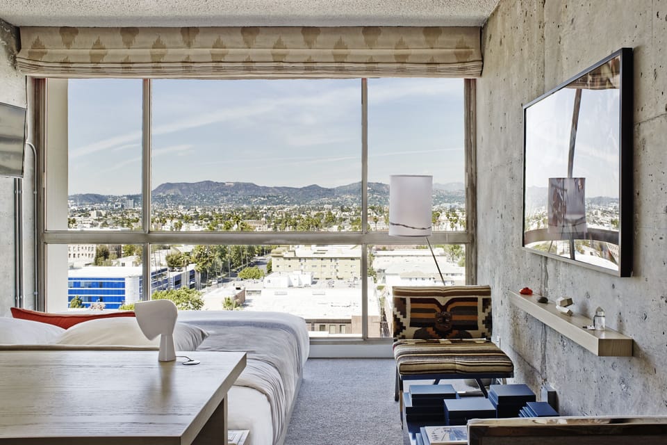 Wake up to sweeping mountain vistas from your bed.
