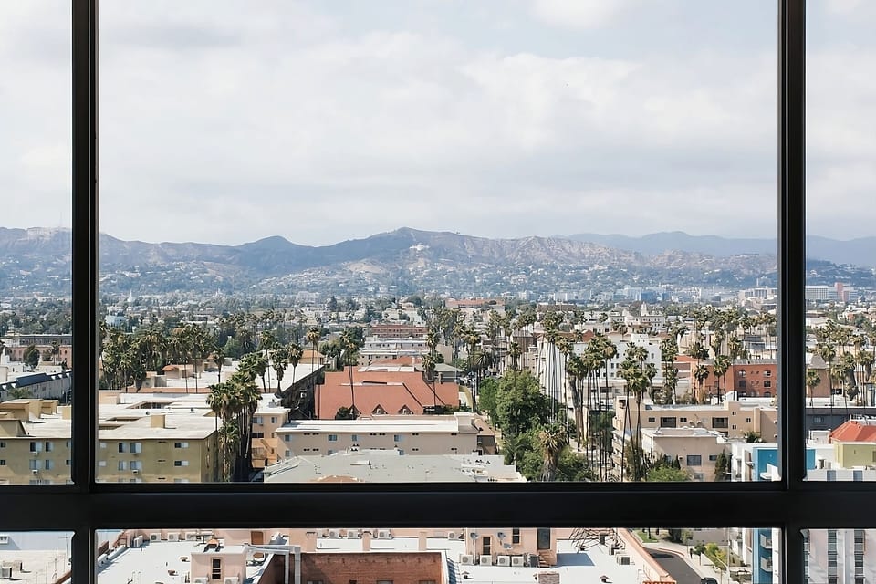 Soak in sunlit city-and-mountain panoramas from above it all.