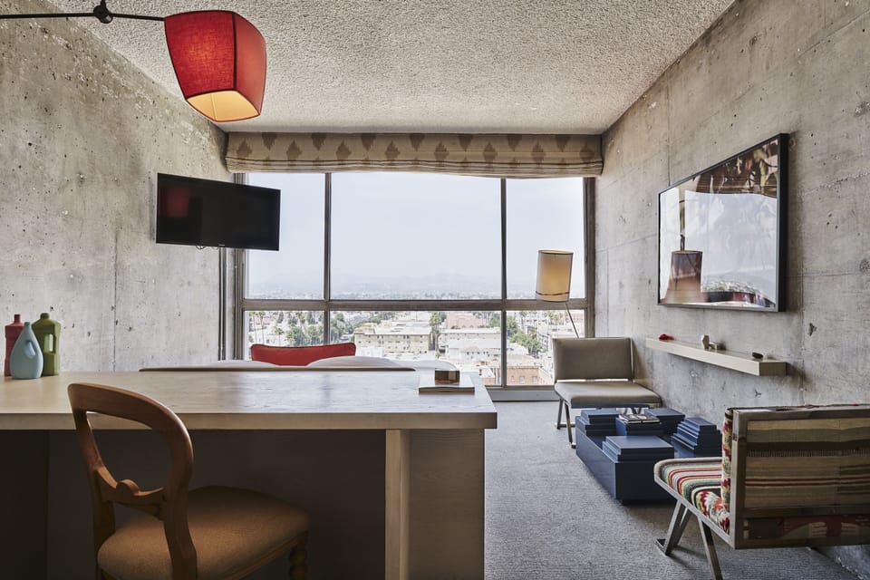 Stretch out in a spacious room framed by city views.