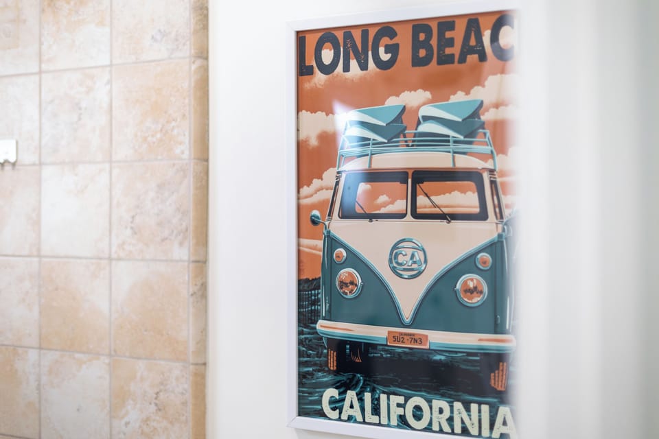 Coastal-inspired wall art adds a fun California beach vibe