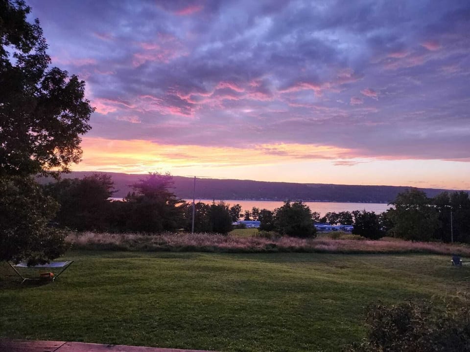 Enjoy stunning sunsets while relaxing on the deck