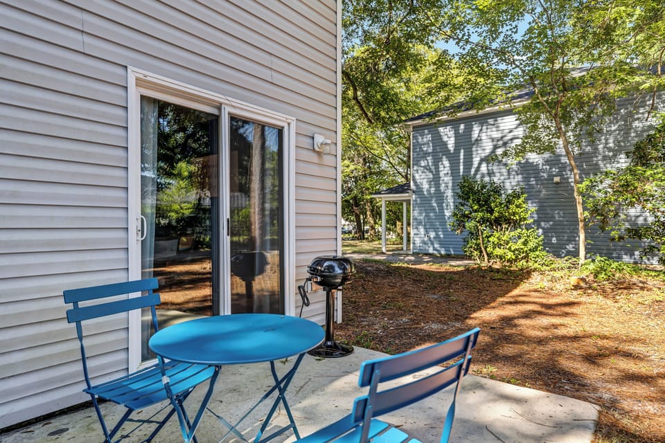 {PRIVATE PATIO} Step into a tranquil outdoor haven on the patio with BBQ grill.