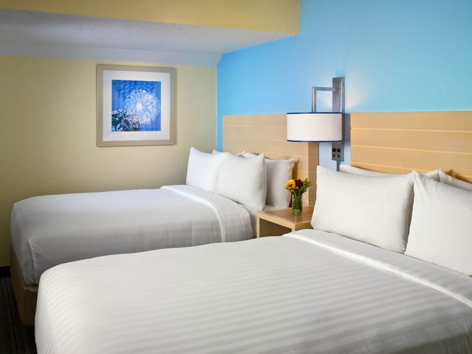 Settle into crisp linens with two beds for easy sharing.