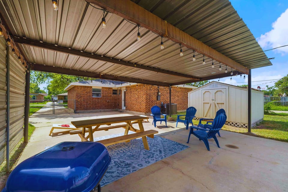 Outdoor Patio: Gather under string lights for BBQs and laughter in this vibrant outdoor retreat!