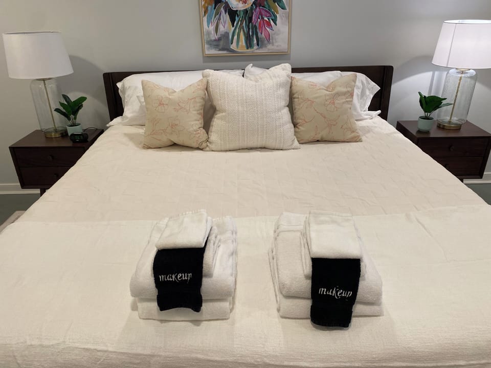 Primary bedroom with king bed and private en suite bath
