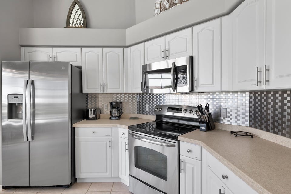 Fully Equipped Kitchen with Stainless Steel Appliances