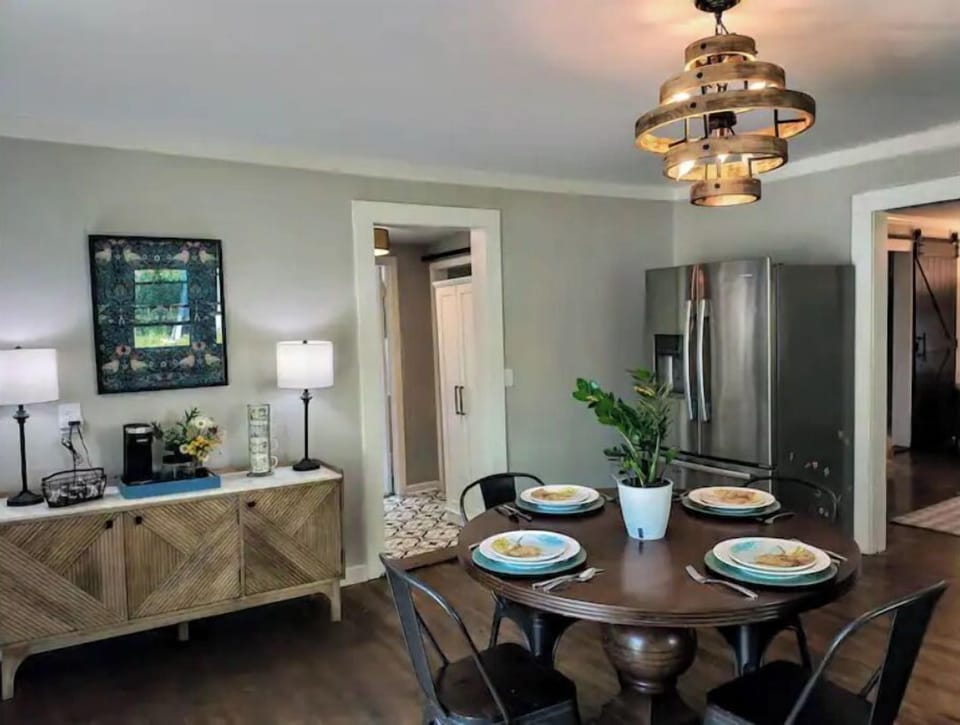 Dining area adjacent to laundry room, bathrooms, and master bedroom