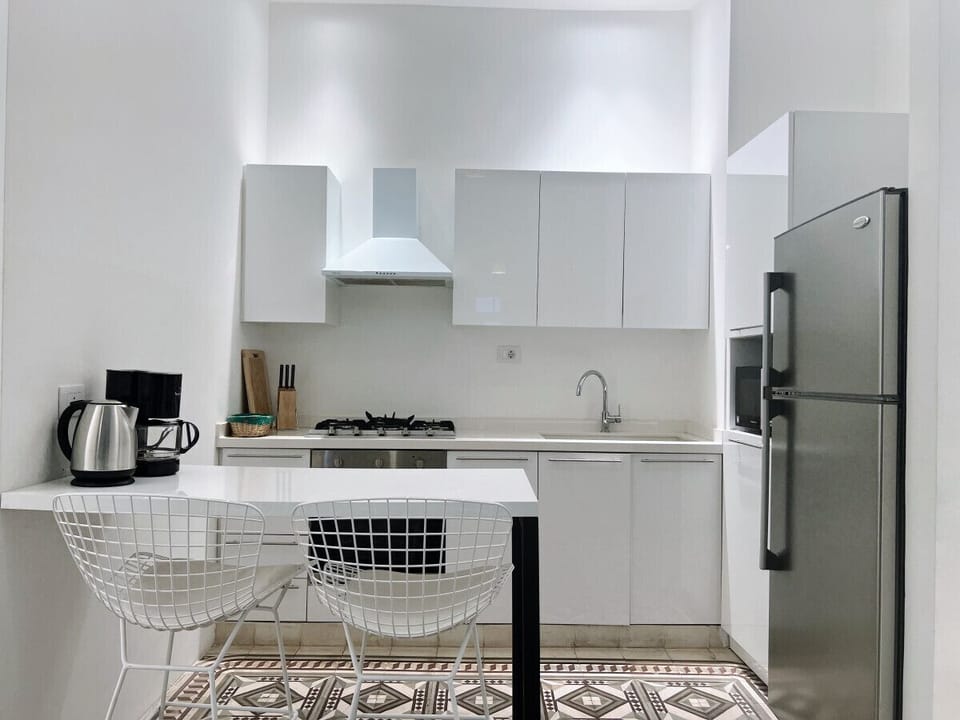enjoy cooking in this sleek, open concept kitchen.
