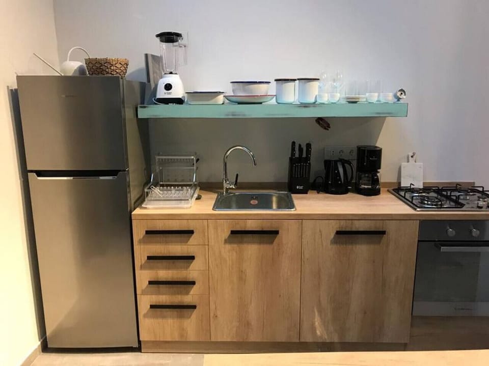 Well-designed kitchenette with a modern, practical layout