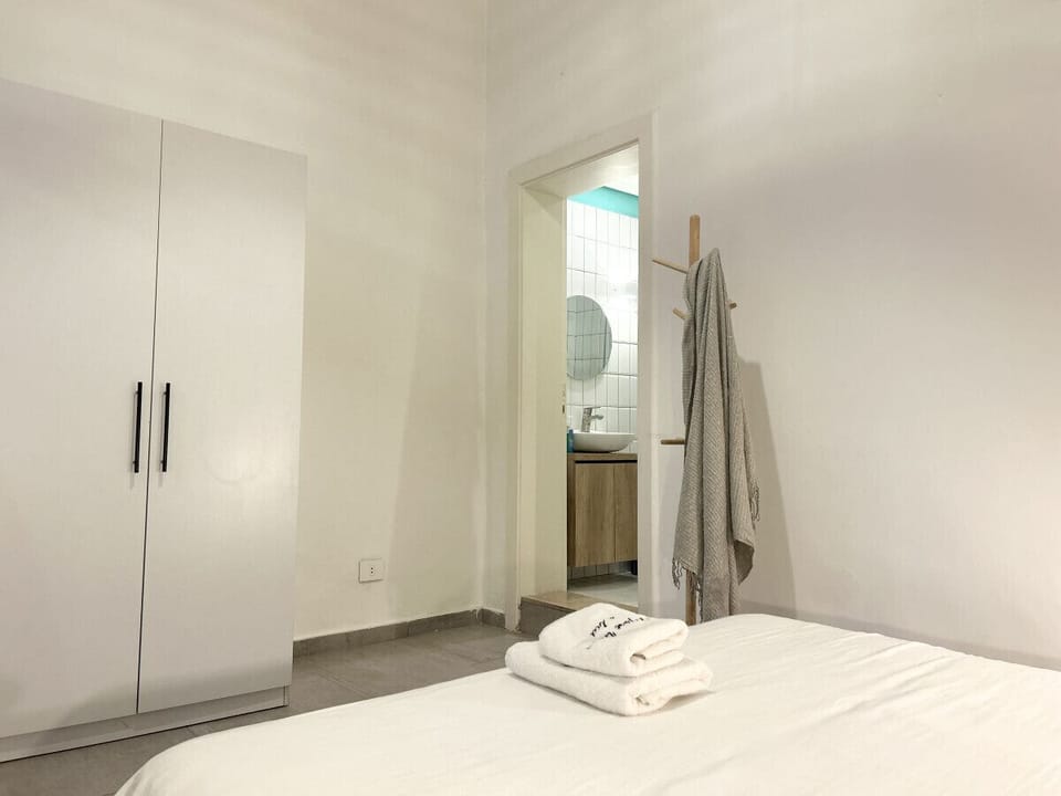 Comfortable bedroom setup with ample storage