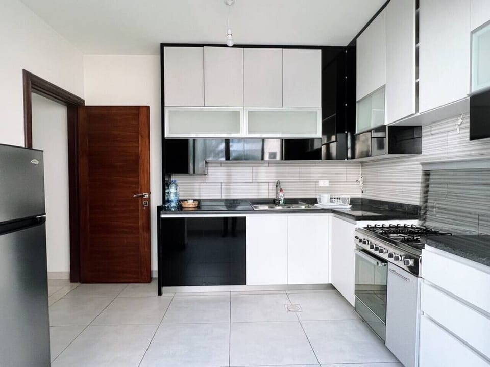 Fully functional modern kitchen equipped with everything you need for a convenient stay.