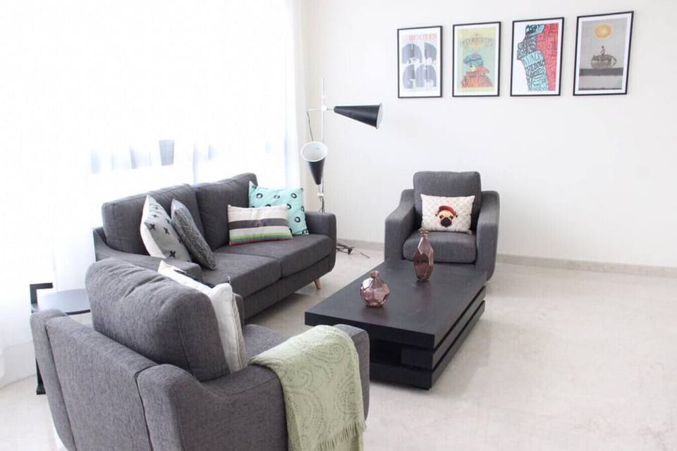 Relaxing lounge space equipped with plush seating and a contemporary aesthetic.