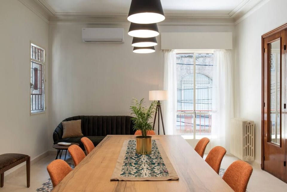 A beautiful blend of character and comfort. Enjoy an open-concept dining space that seamlessly transitions into an intimate seating nook, complete with split-system air conditioning.