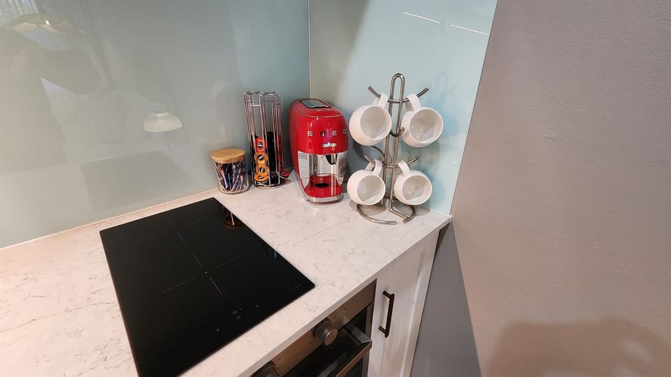 Coffee pod station and induction cook top