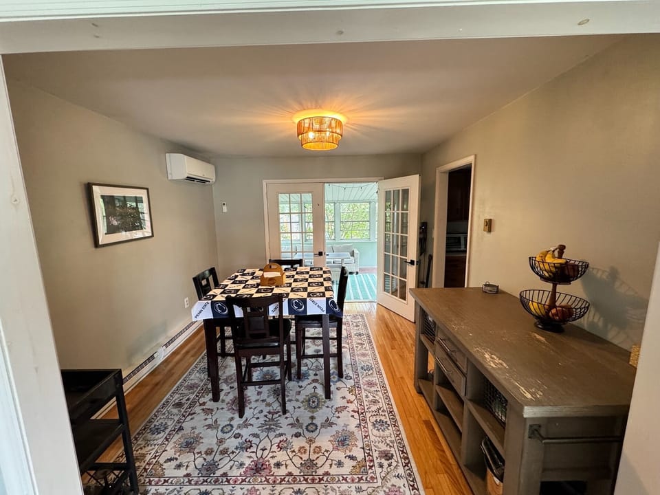 Dining room opens to sunroom