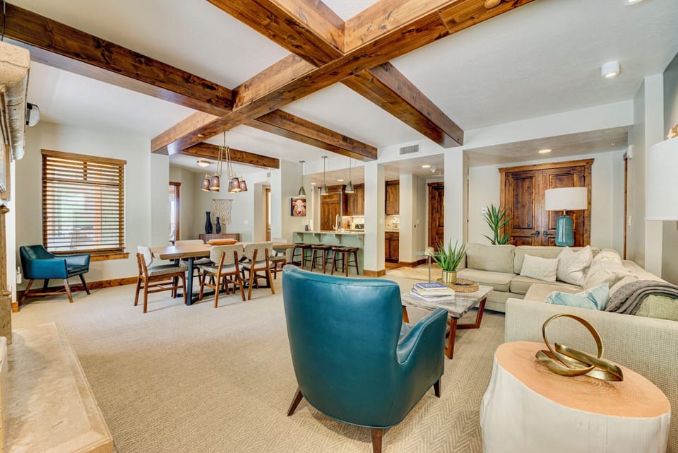 Fireside seating and a large dining table are welcoming or pull up a stool and socialize around the kitchen.