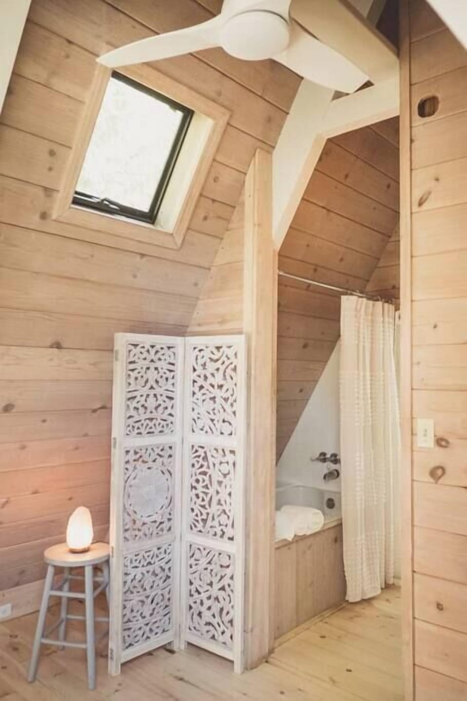 A full-size soaking tub awaits to soothe your mind and relax your body. Himalayan salt lamp nearby to ionize air quality and aid in mood support. 
